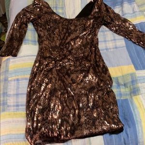 Guess brand gold and black sparkly mini dress.